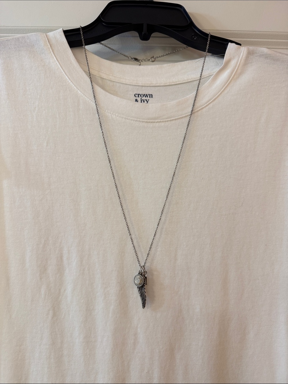 Premier silver wing pendant necklace with white stone
